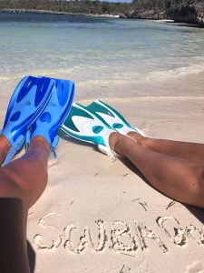 A happy purchase of our snorkel flippers. Shown here on a sunny Cuba beach. Excellent for taking on holiday!